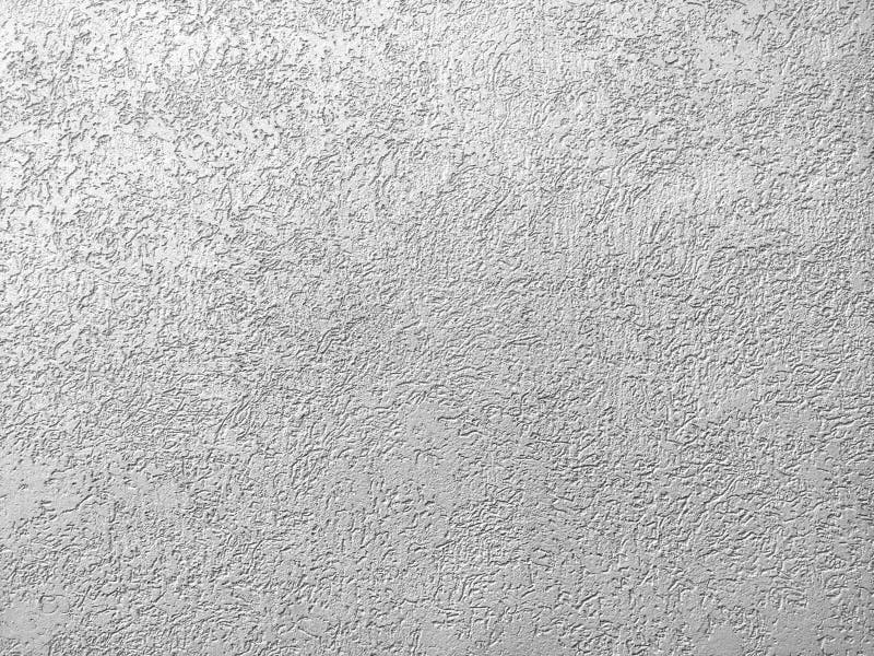 Texture of the grey plaster bark beetle on the wall. Seamless texture. The texture of the plaster is bark beetle on the wall. Seamless grey texture stock photo